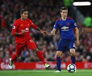 LIVERPOOL, ENGLAND - OCTOBER 17:  Ander Herrera of Manchester United is closed down by Roberto Firmino of Liverpool during the Premier League match between Liverpool and Manchester United at Anfield on October 17, 2016 in Liverpool, England.  (Photo by Clive Brunskill/Getty Images)